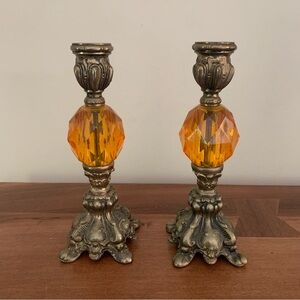 Vintage pair of brass and amber lucite candlesticks.
